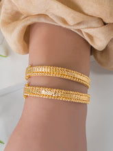 21k Gold Bangle - Cleopatra Jewelers